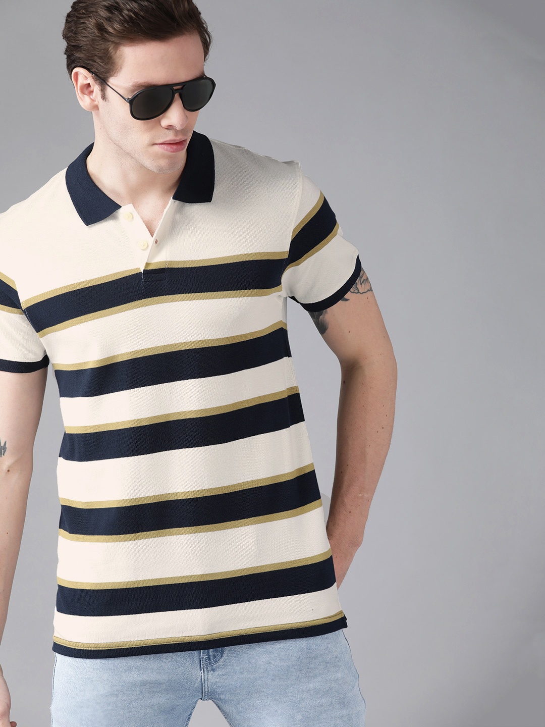 

Roadster Men Off White & Navy Blue Striped Polo Collar Pure Cotton T-shirt