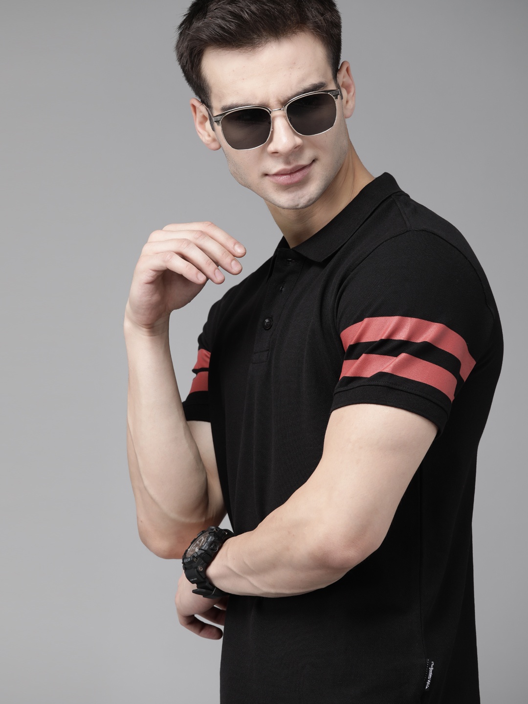 

The Roadster Lifestyle Co Men Black Pure Cotton Solid Polo Collar T-shirt