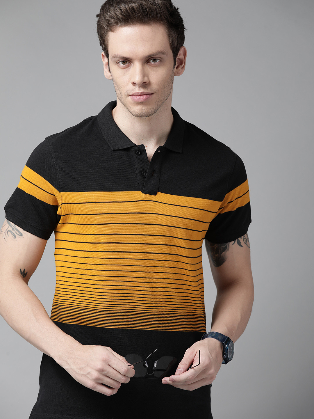 

Roadster Men Black & Mustard Yellow Striped Polo Collar Pure Cotton T-shirt