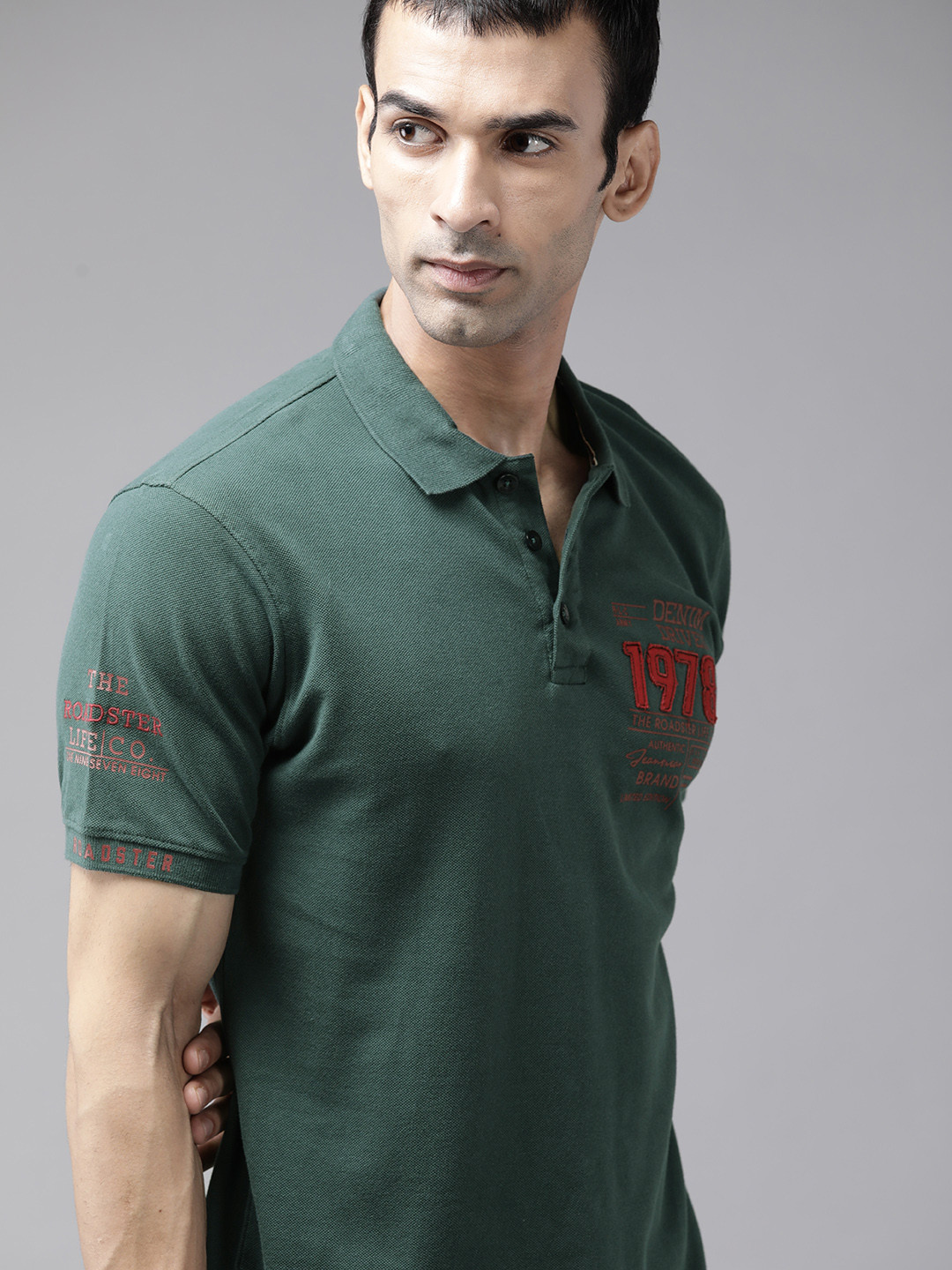 

The Roadster Lifestyle Co Men Green Printed Pure Cotton Polo Collar Pure Cotton T-shirt
