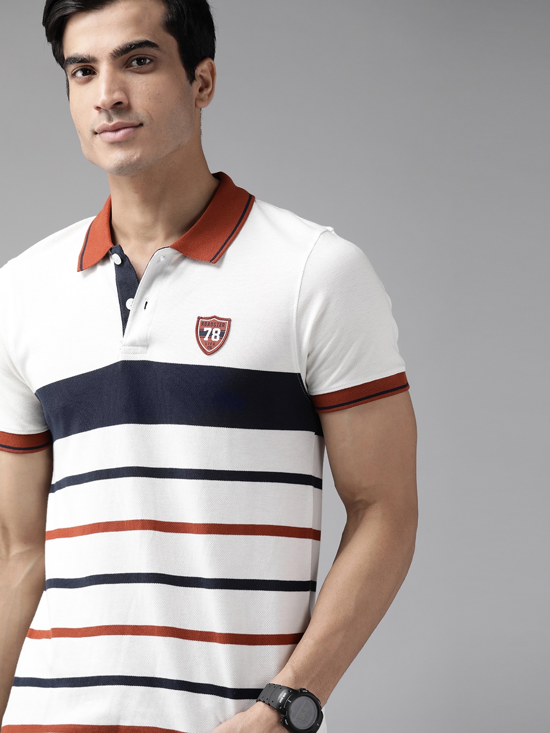 

The Roadster Lifestyle Co Men White & Navy Blue Striped Cotton Polo Collar T-shirt