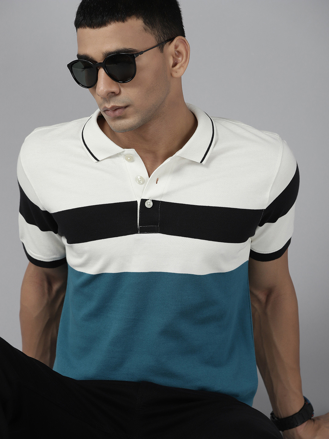 

Roadster Men Off White & Teal Blue Colourblocked Polo Collar Pure Cotton T-shirt