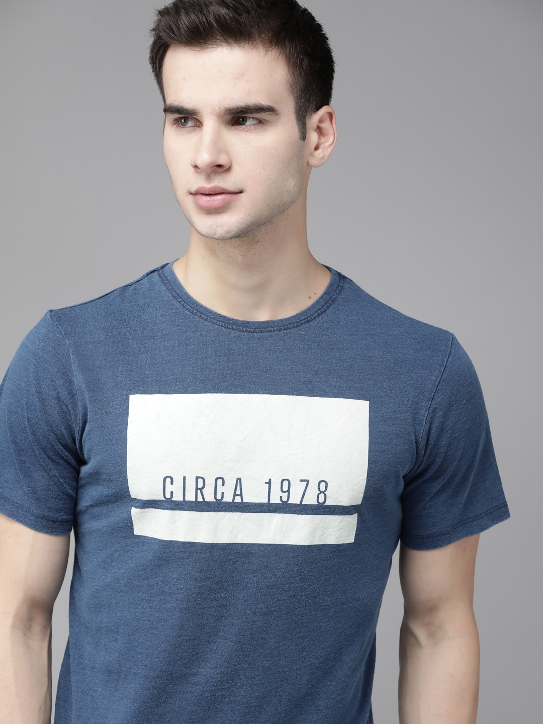 

The Roadster Lifestyle Co Men Blue & White Pure Cotton Printed Round Neck T-shirt