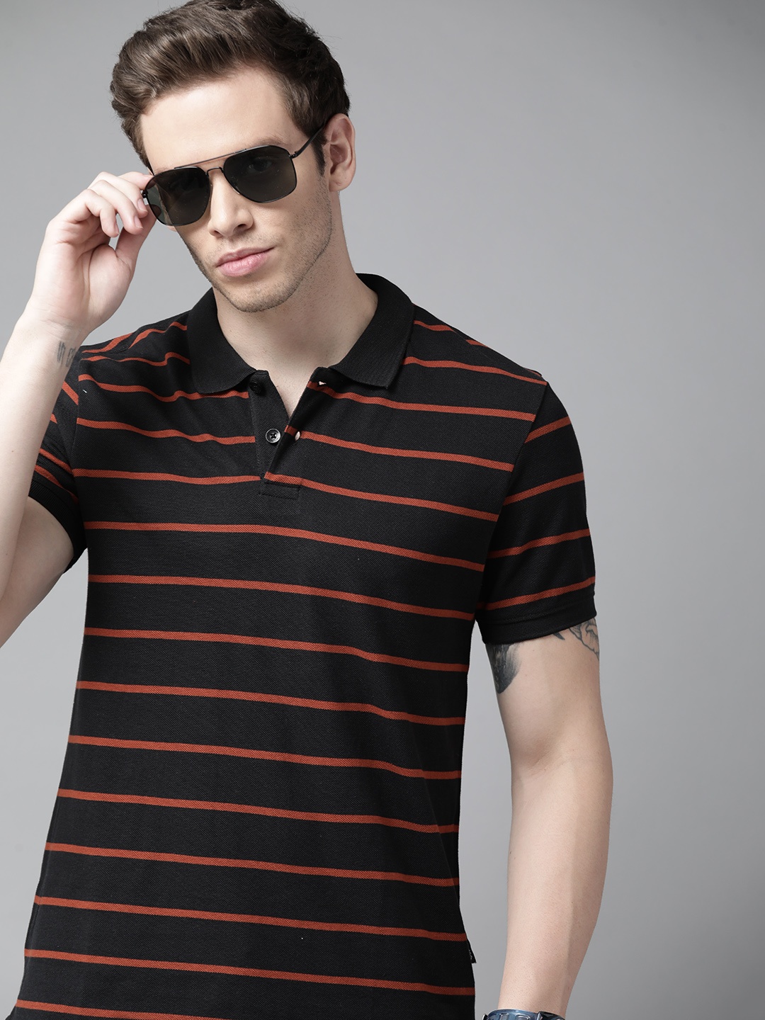 

Roadster Men Black & Brown Striped Polo Collar Pure Cotton T-shirt