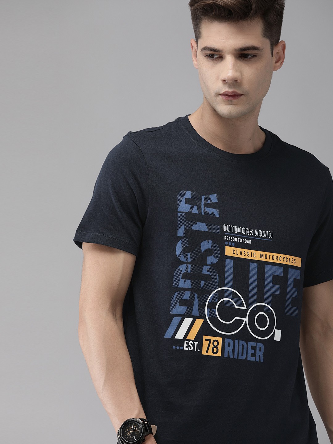

The Roadster Lifestyle Co Men Navy Blue Yellow Brand Logo Print Round Neck Pure Cotton T-shirt