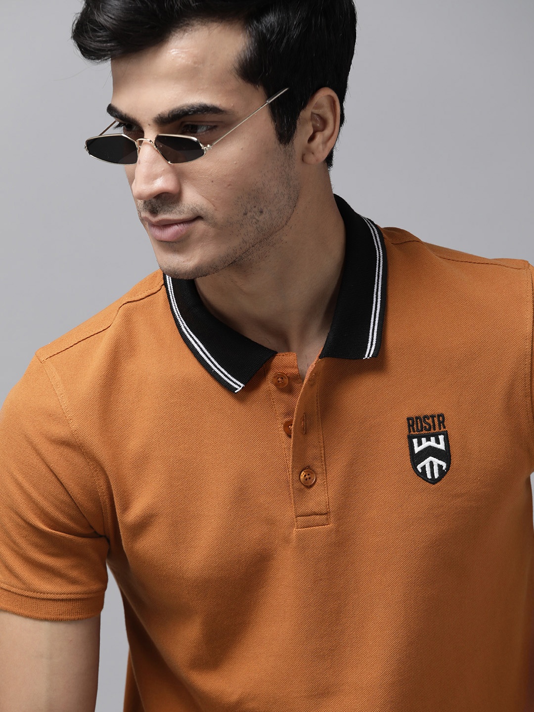 

The Roadster Lifestyle Co Men Rust Pure Cotton Solid Polo Collar Pure Cotton T-shirt