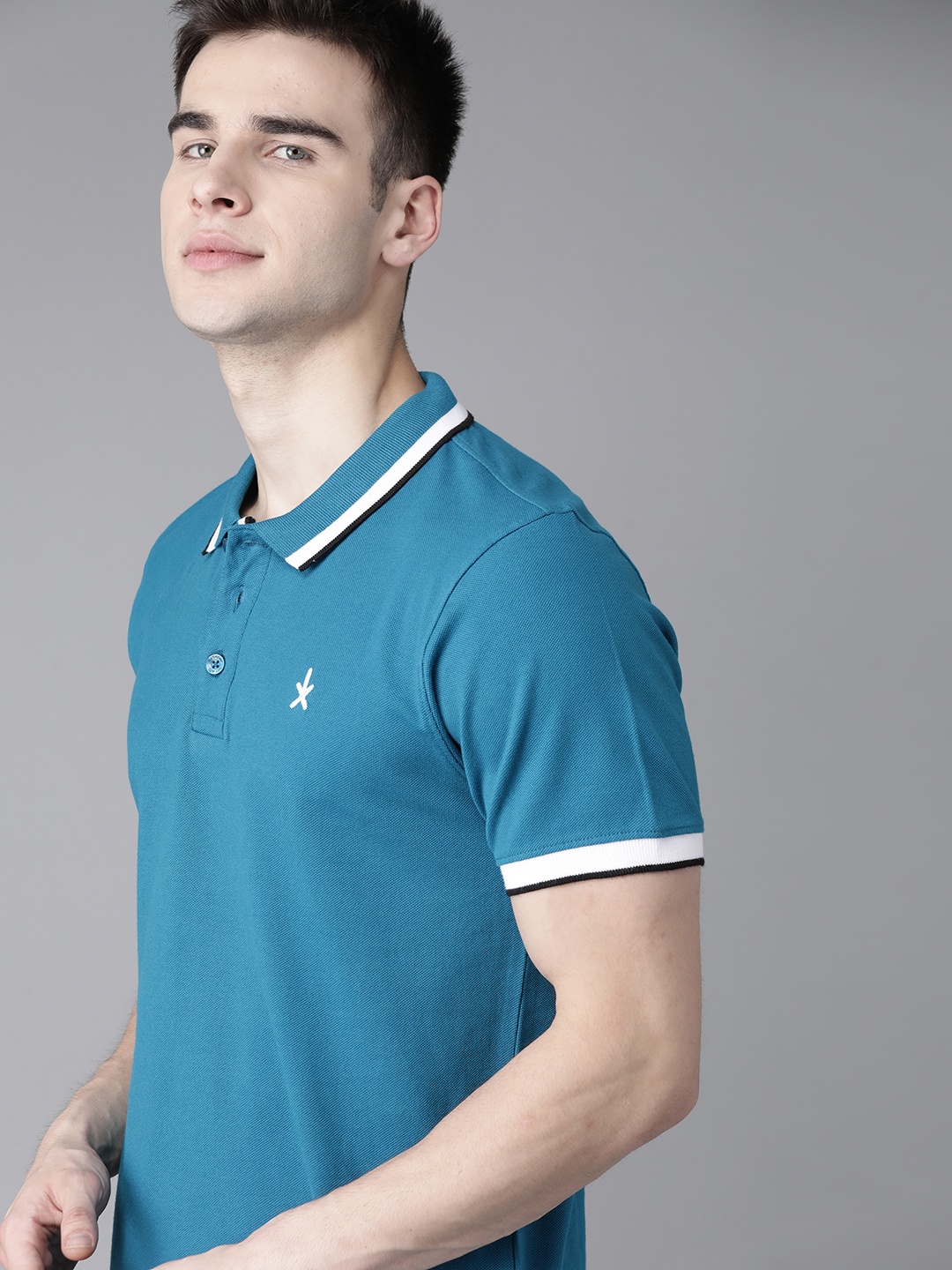 

The Roadster Lifestyle Co Men Blue Solid Polo Collar T-shirt