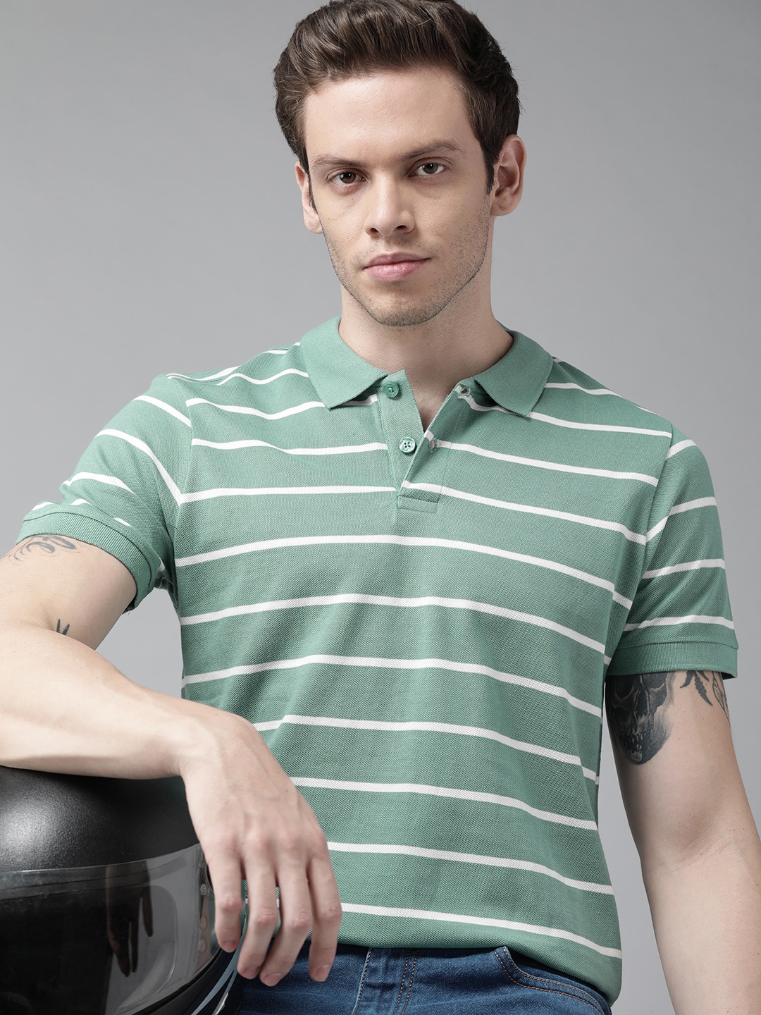 

Roadster Men Green & White Striped Polo Collar Pure Cotton T-shirt