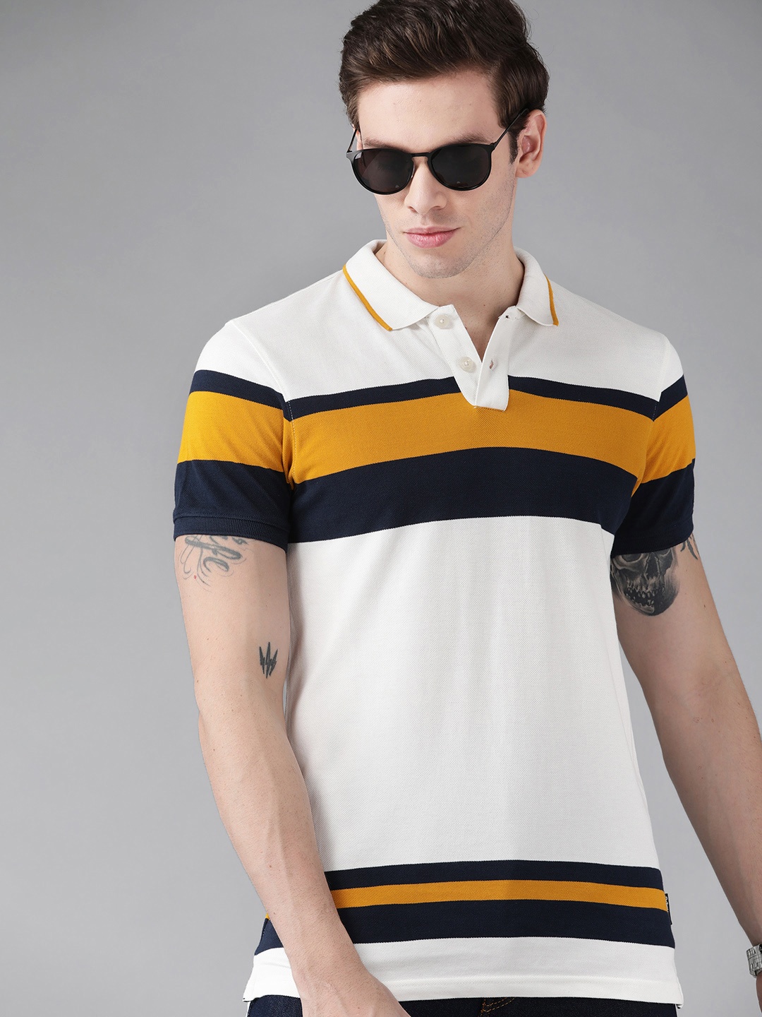 

Roadster Men Off White & Navy Blue Colourblocked Polo Collar Pure Cotton T-shirt