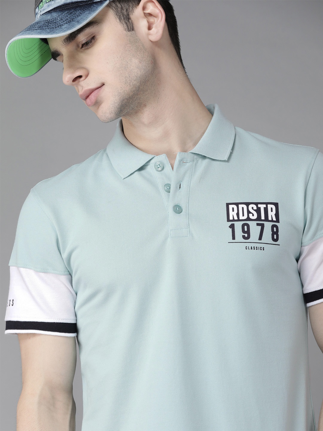 

The Roadster Lifestyle Co Men Blue Pure Cotton Brand Logo Polo Collar T-shirt