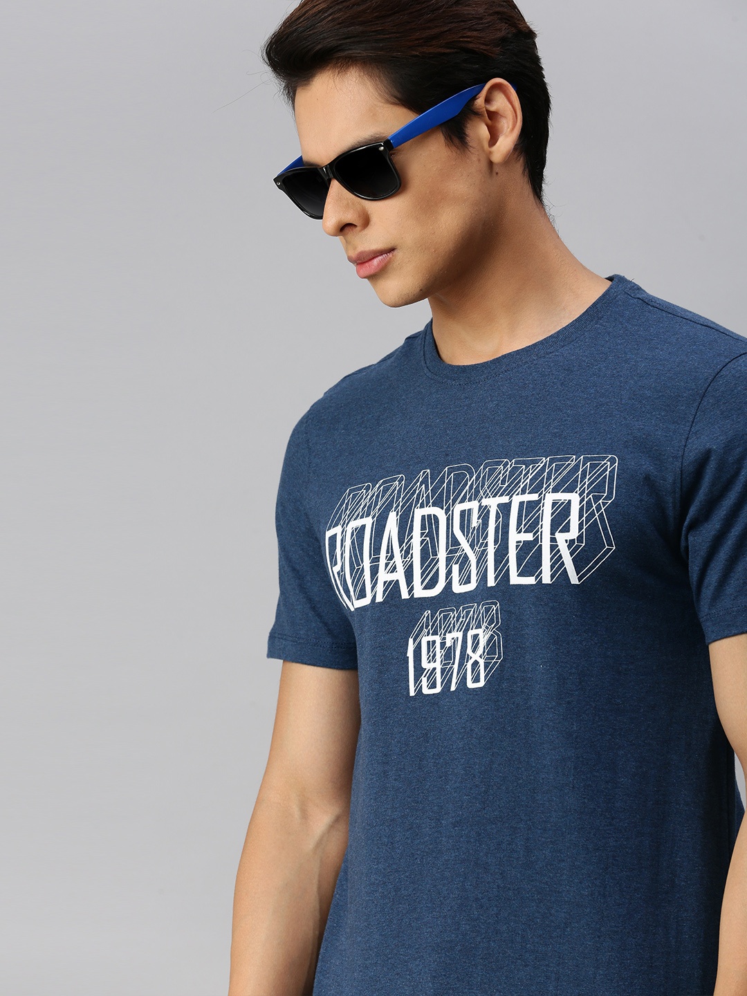 

The Roadster Lifestyle Co Men Blue Typography Printed Pure Cotton T-shirt