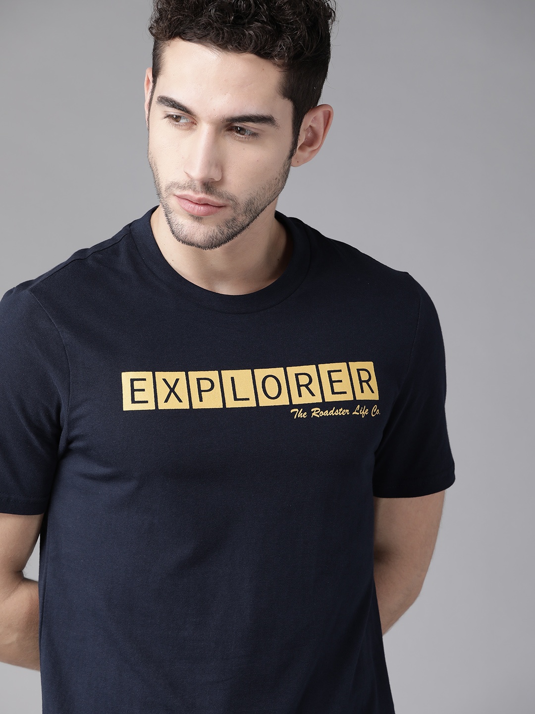 

The Roadster Lifestyle Co Men Navy Blue & Yellow Printed Pure Cotton Round Neck T-shirt