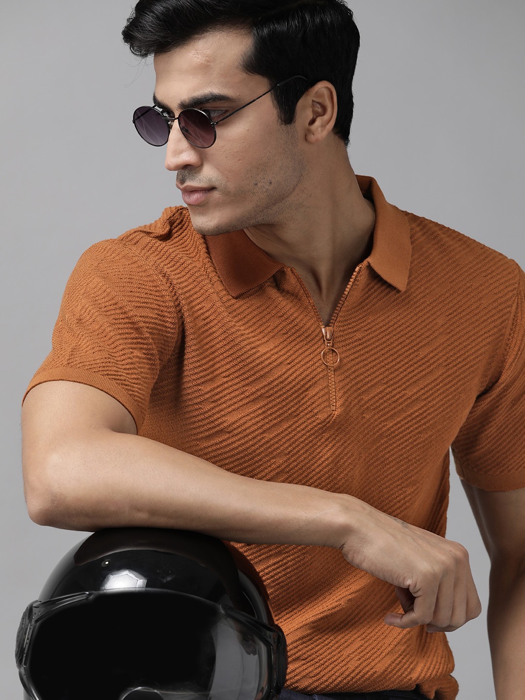 

The Roadster Lifestyle Co Men Rust Orange Self-Design Pure Cotton Polo Collar T-shirt