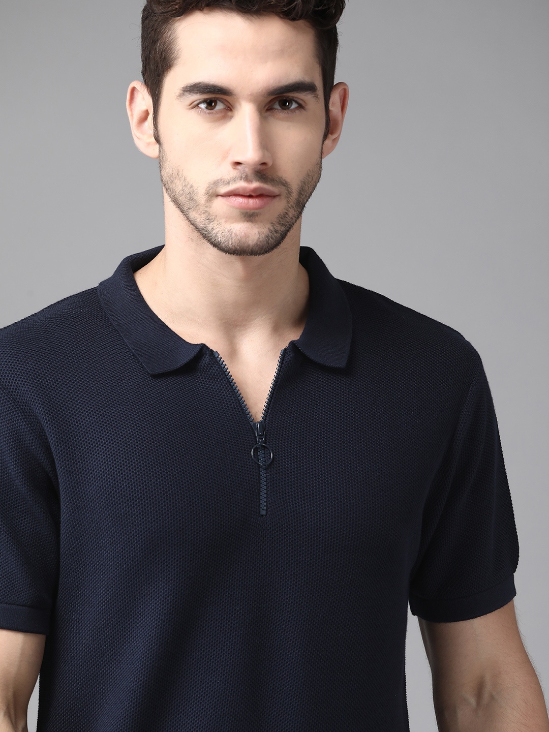 

The Roadster Lifestyle Co Men Navy Blue Self Design Pure Cotton Polo Collar Pure Cotton T-shirt