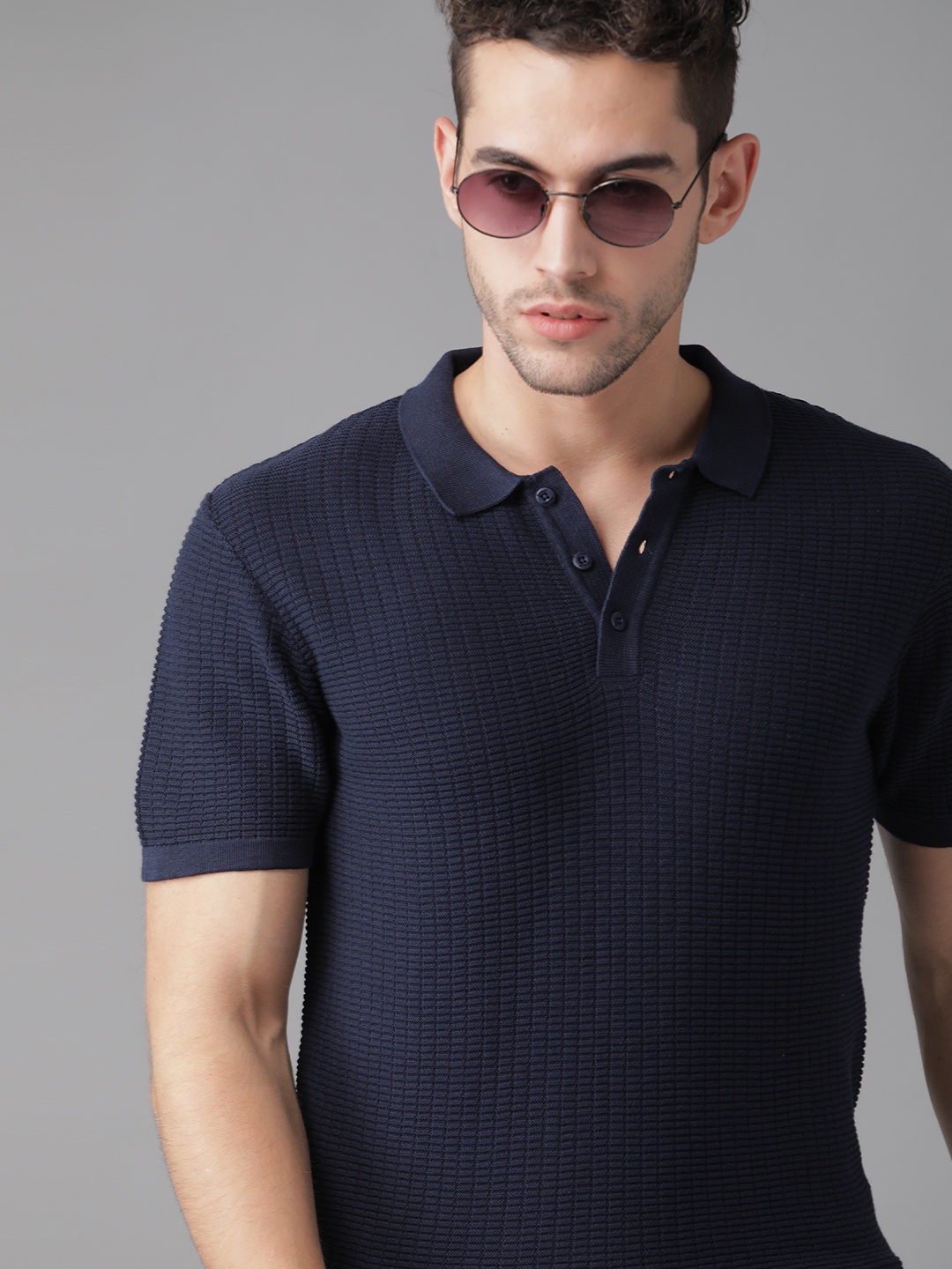 

The Roadster Lifestyle Co Men Navy Blue Pure Cotton Self Design Polo Collar T-shirt