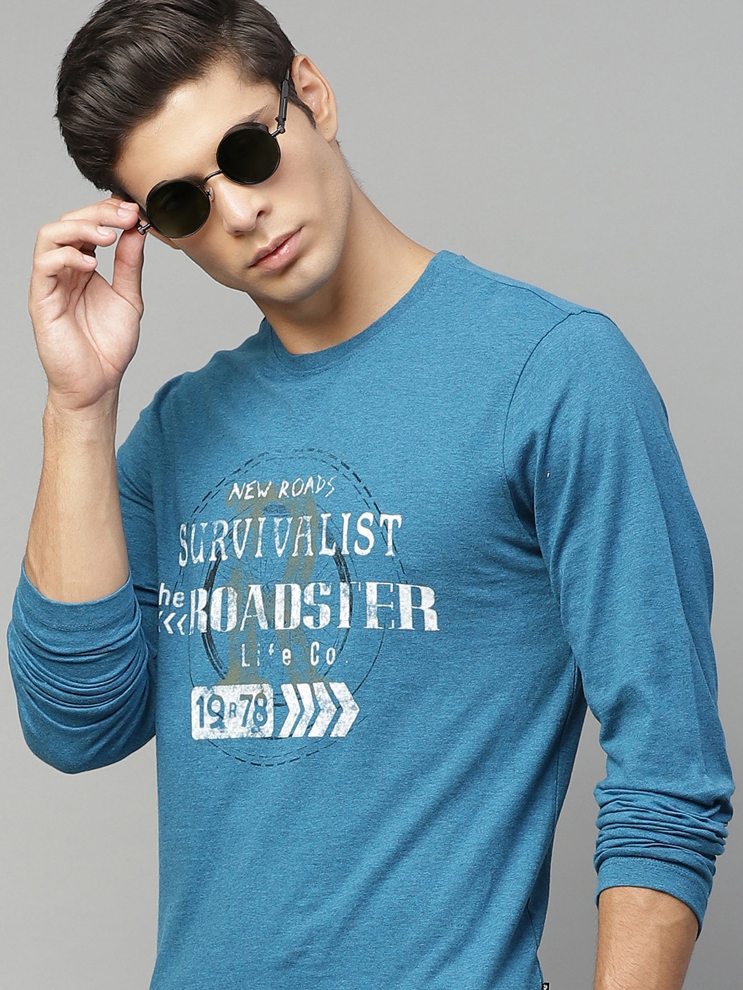 

The Roadster Lifestyle Co Men Blue White Typography Printed Pure Cotton T-shirt