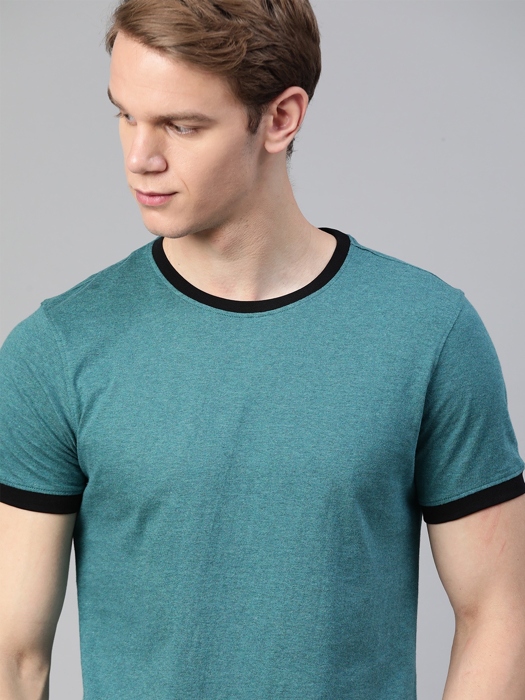 

The Roadster Lifestyle Co Men Teal Blue Solid Pure Cotton T-shirt