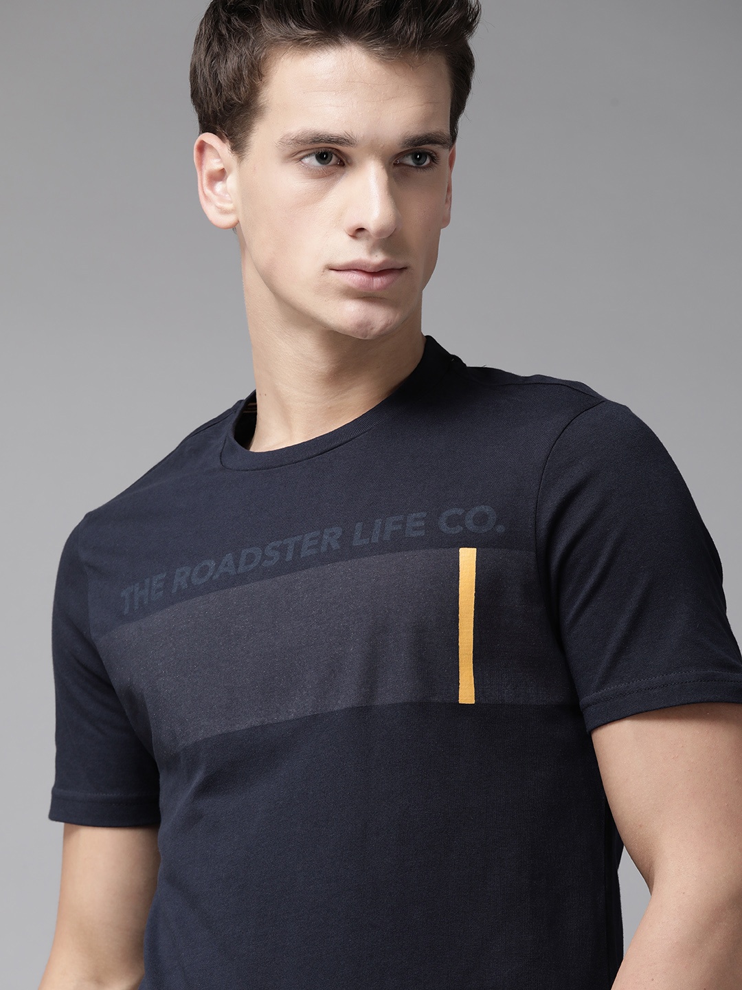 

The Roadster Lifestyle Co Men Navy Blue Brand Logo Print Pure Cotton Round Neck T-shirt