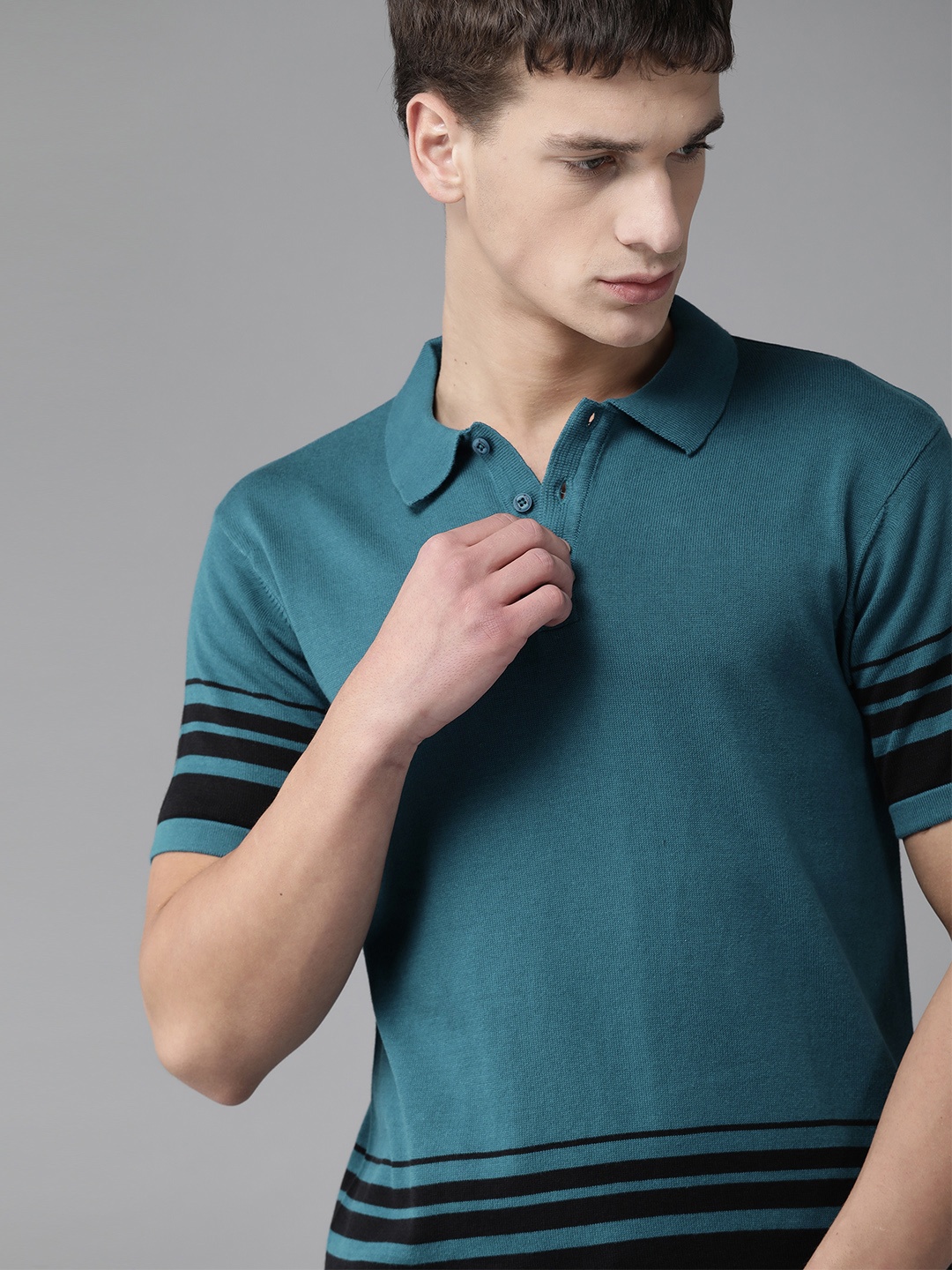 

The Roadster Lifestyle Co Men Teal Blue Solid Cotton Polo Collar T-shirt