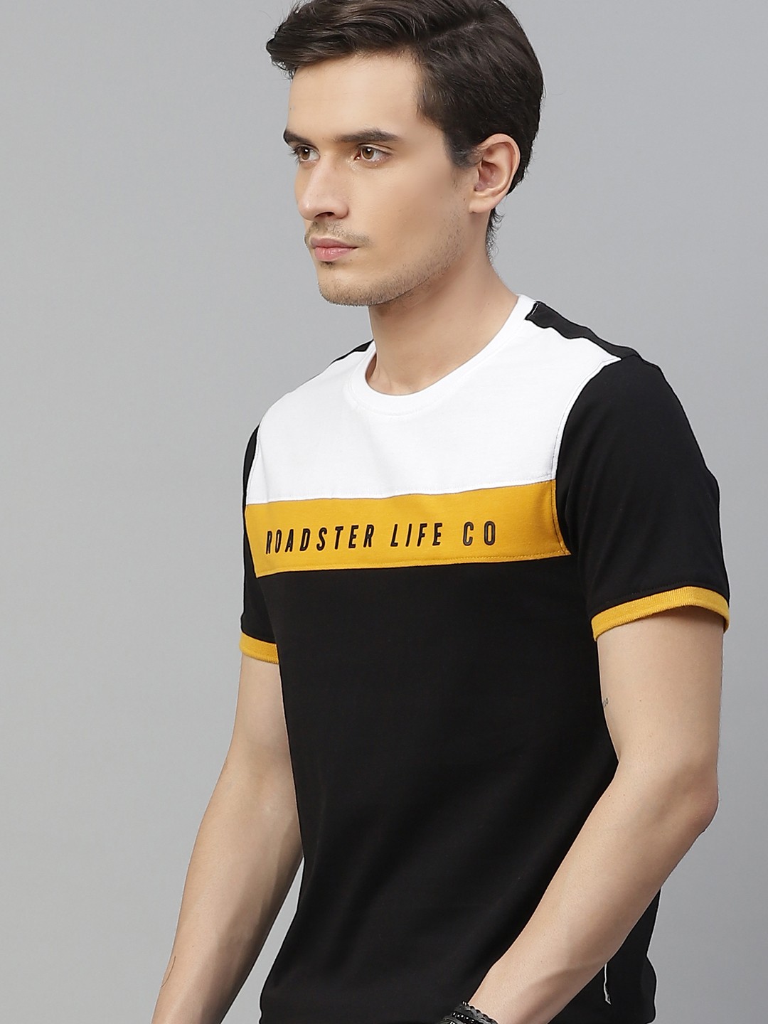 

The Roadster Lifestyle Co Men Black Off-White Brand Logo Colourblocked Pure Cotton T-shirt