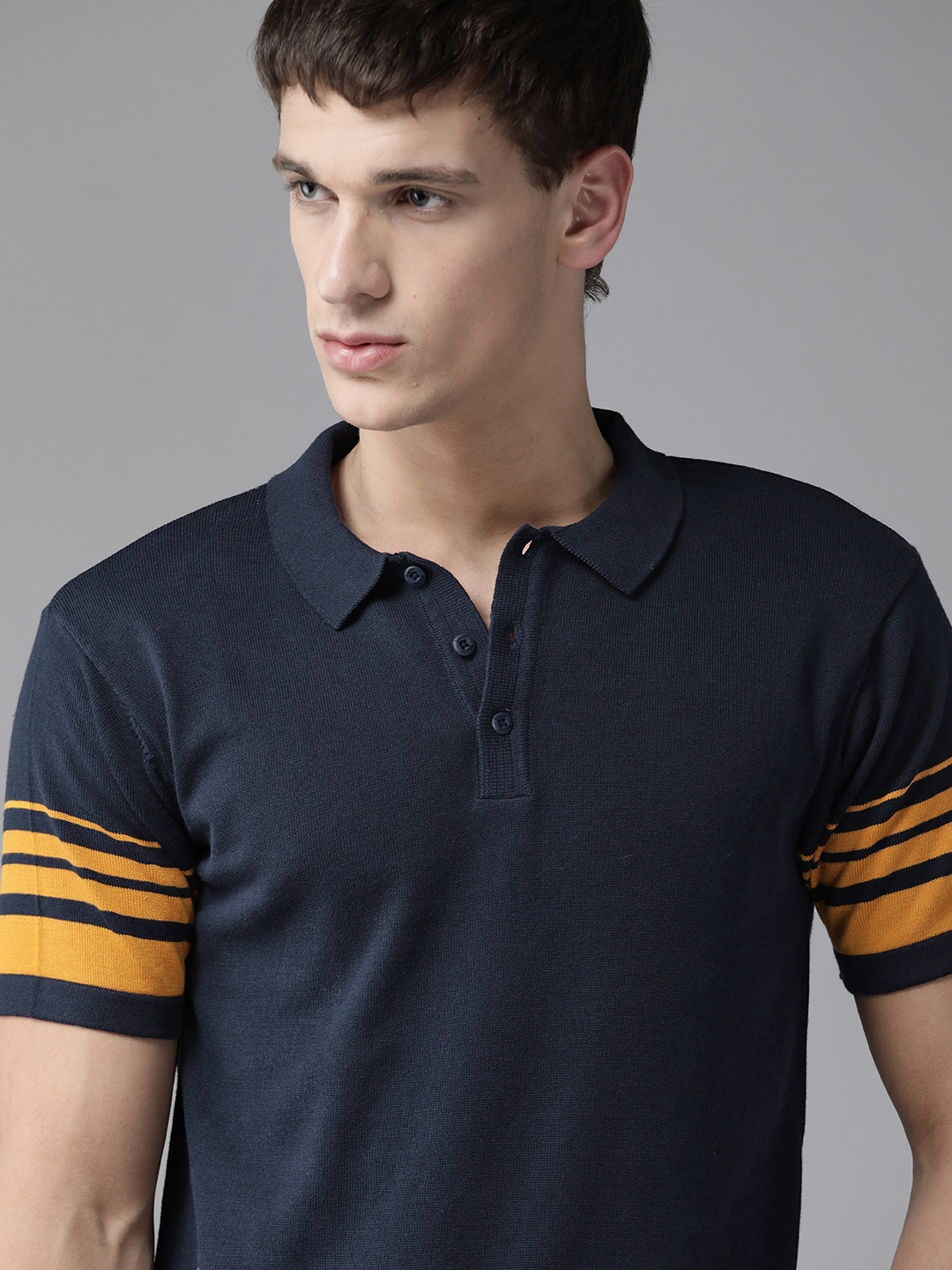 

The Roadster Lifestyle Co Men Navy Blue Solid Cotton Polo Collar T-shirt