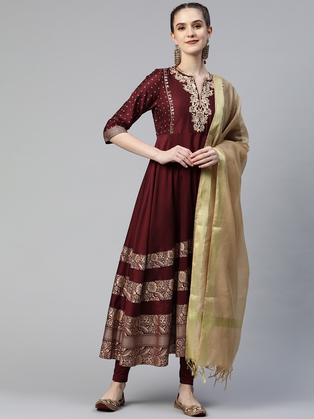 

AURELIA Women Maroon & Golden Floral Printed Panelled Kurta With Dupatta