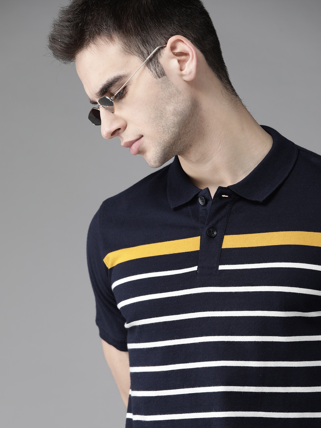 

The Roadster Lifestyle Co Men Navy Blue & White Striped Polo Collar T-shirt