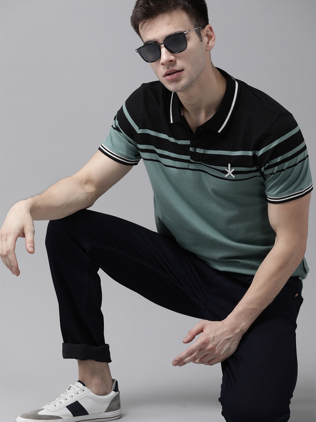 

The Roadster Lifestyle Co Men Green Colourblocked Polo Collar T-shirt