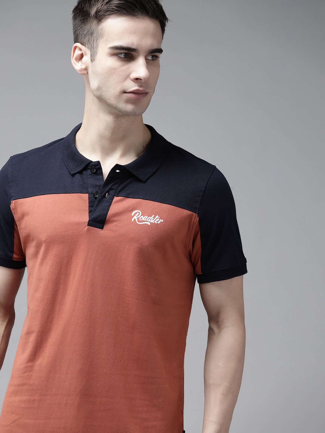 

The Roadster Lifestyle Co Men Rust Orange Navy Blue Colourblocked Pure Cotton Polo Collar Pure Cotton T-shirt