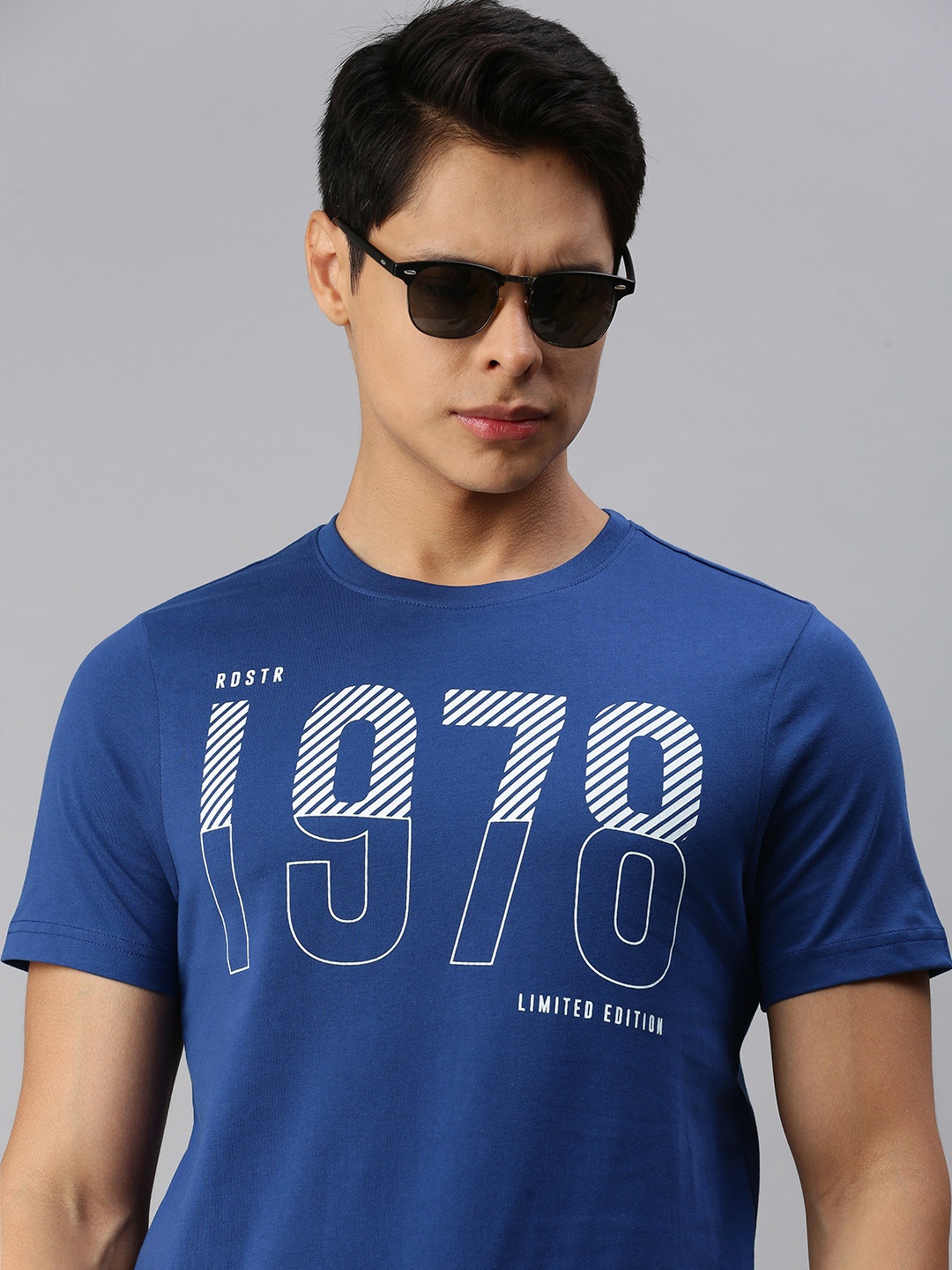 

The Roadster Lifestyle Co Men Blue Typography Printed Pure Cotton T-shirt