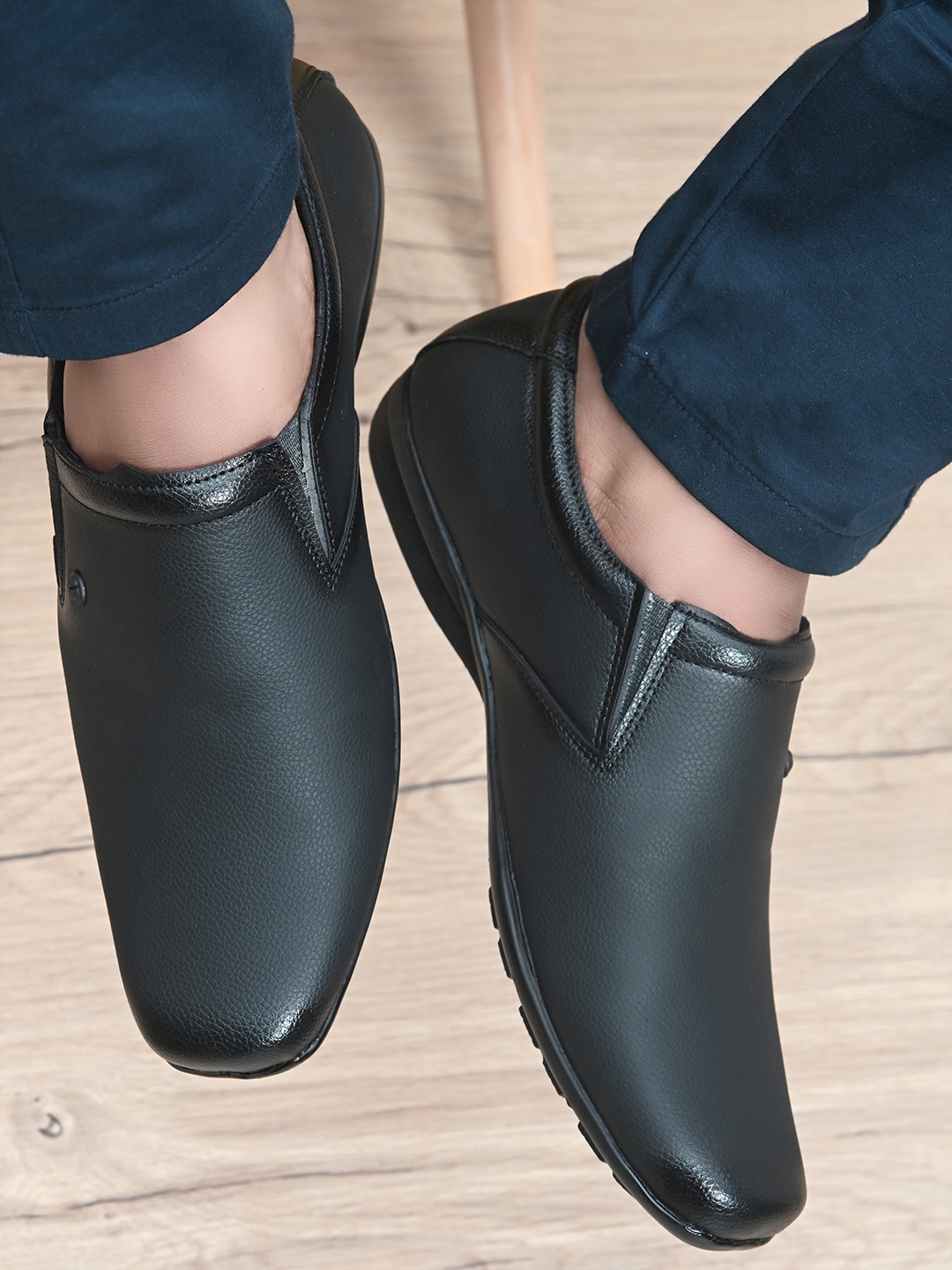 

Prolific Men Black Solid Formal Slip-On Shoes