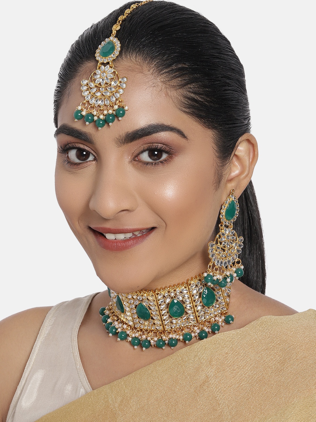 

Zaveri Pearls Green Gold-Plated Kundan Choker Necklace, Earring & Maangtikka Set