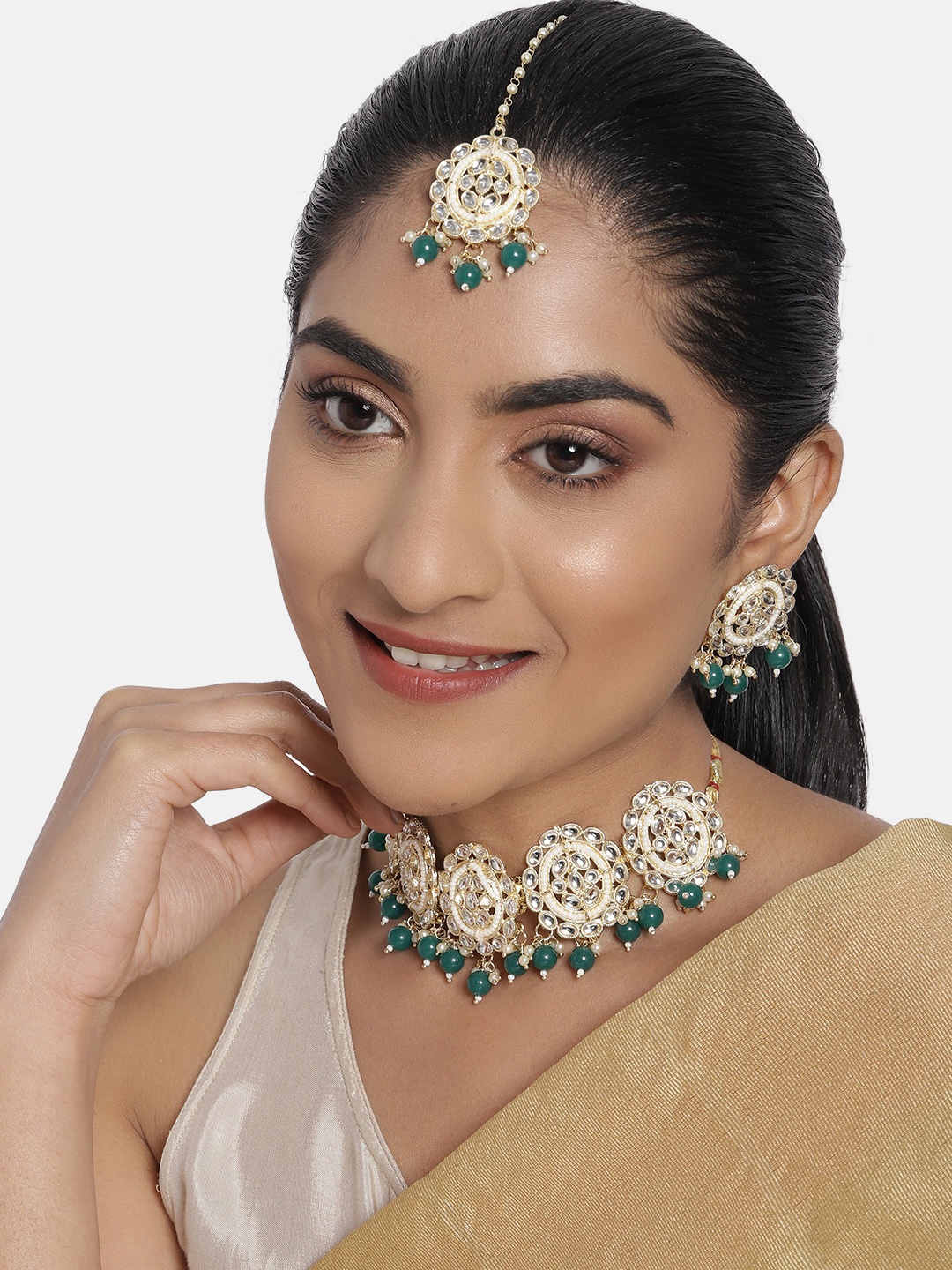 

Zaveri Pearls White & Green Gold-Plated Kundan Studded Jewellery Set