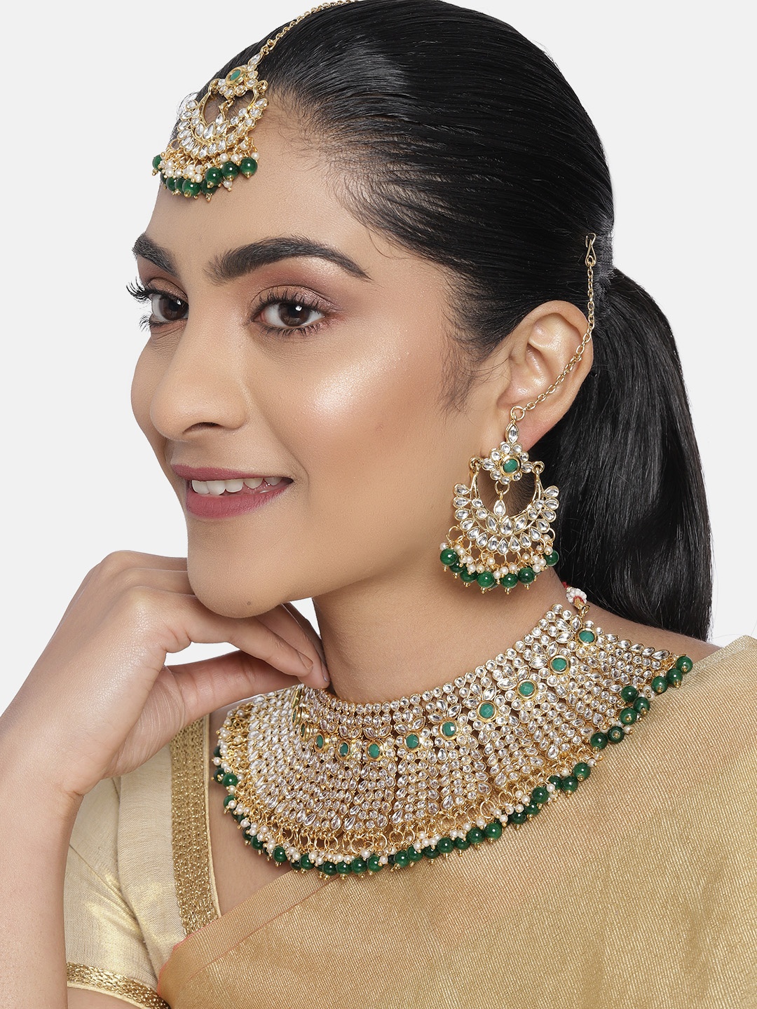 

Zaveri Pearls Green Gold-Plated Kundan Beaded Bridal Jewellery Set