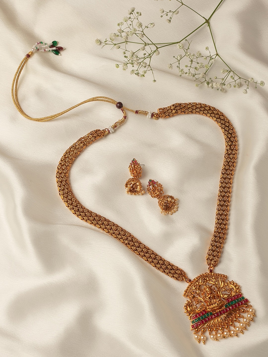 

Zaveri Pearls Antique Gold-Plated Studded Long Temple Jewellery Set