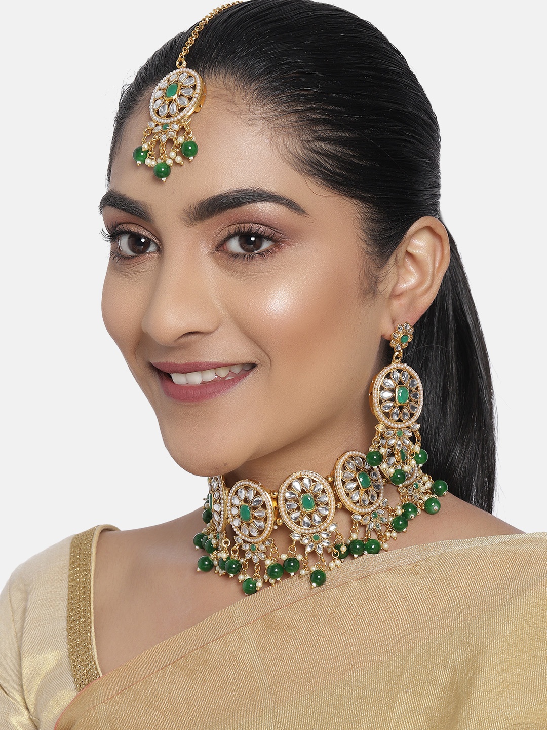 

Zaveri Pearls Green Gold-Plated Kundan Beaded Jewellery Set