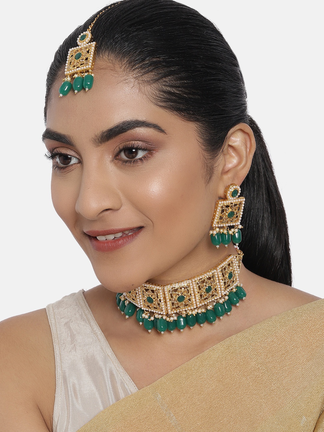 

Zaveri Pearls Green Gold-Plated Stone Studded & Beaded Jewellery Set