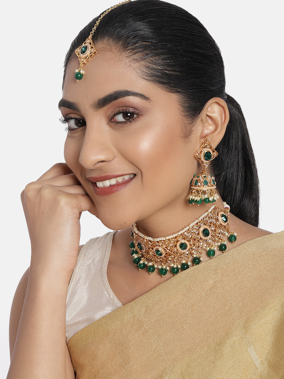

Zaveri Green Gold-Plated Wedding Collection Choker Necklace, Earring & Maangtikka Set