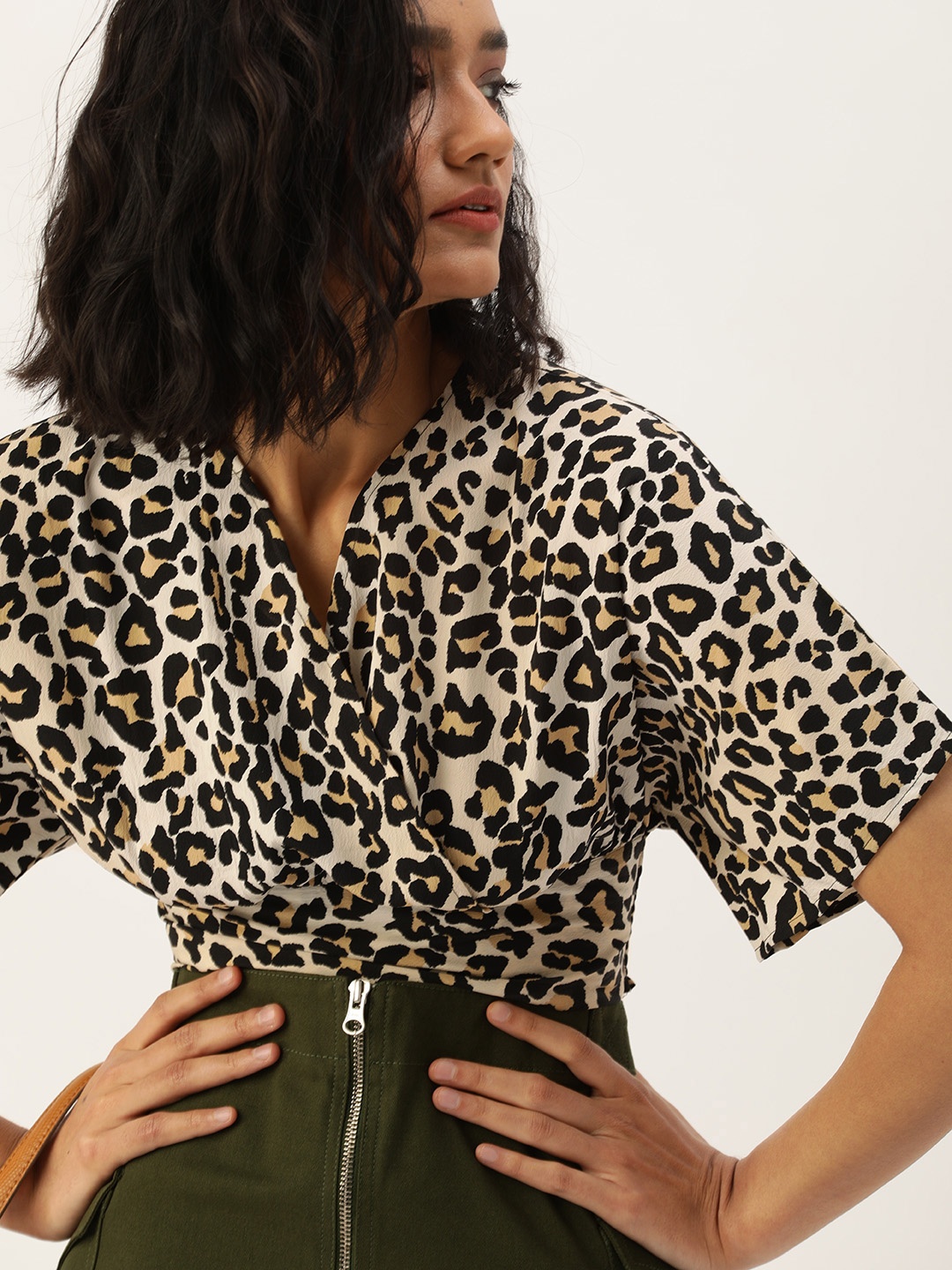 

Style Quotient Off White & Black Animal Printed Crepe Blouson Crop Top