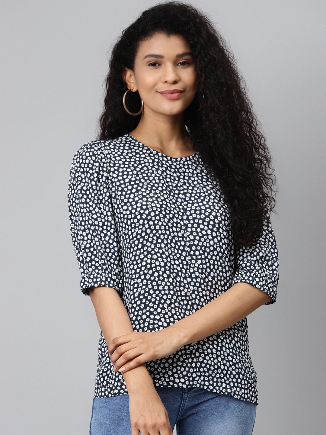 

Marks & Spencer Navy Blue & White Floral Printed Puff Sleeves Top
