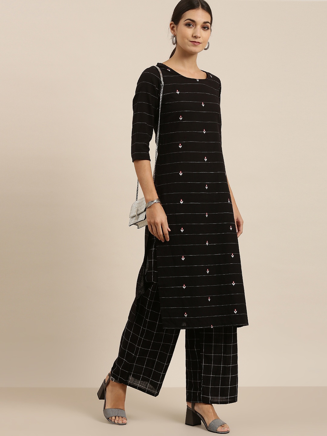 

Vishudh Women Black & White Striped Cotton Kurta with Palazzos
