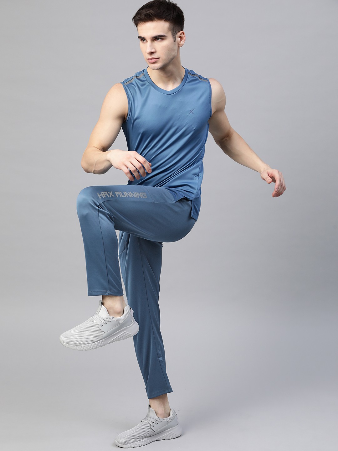 

HRX By Hrithik Roshan Men Blue Horizon Typographic Tapered Rapid-Dry Running Track Pants