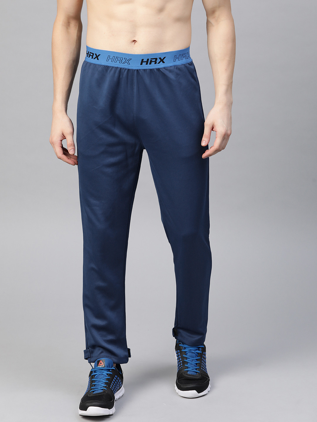 

HRX By Hrithik Roshan Men Estate Blue Solid Tappered Fit Rapid-Dry Running Track Pants, Navy blue