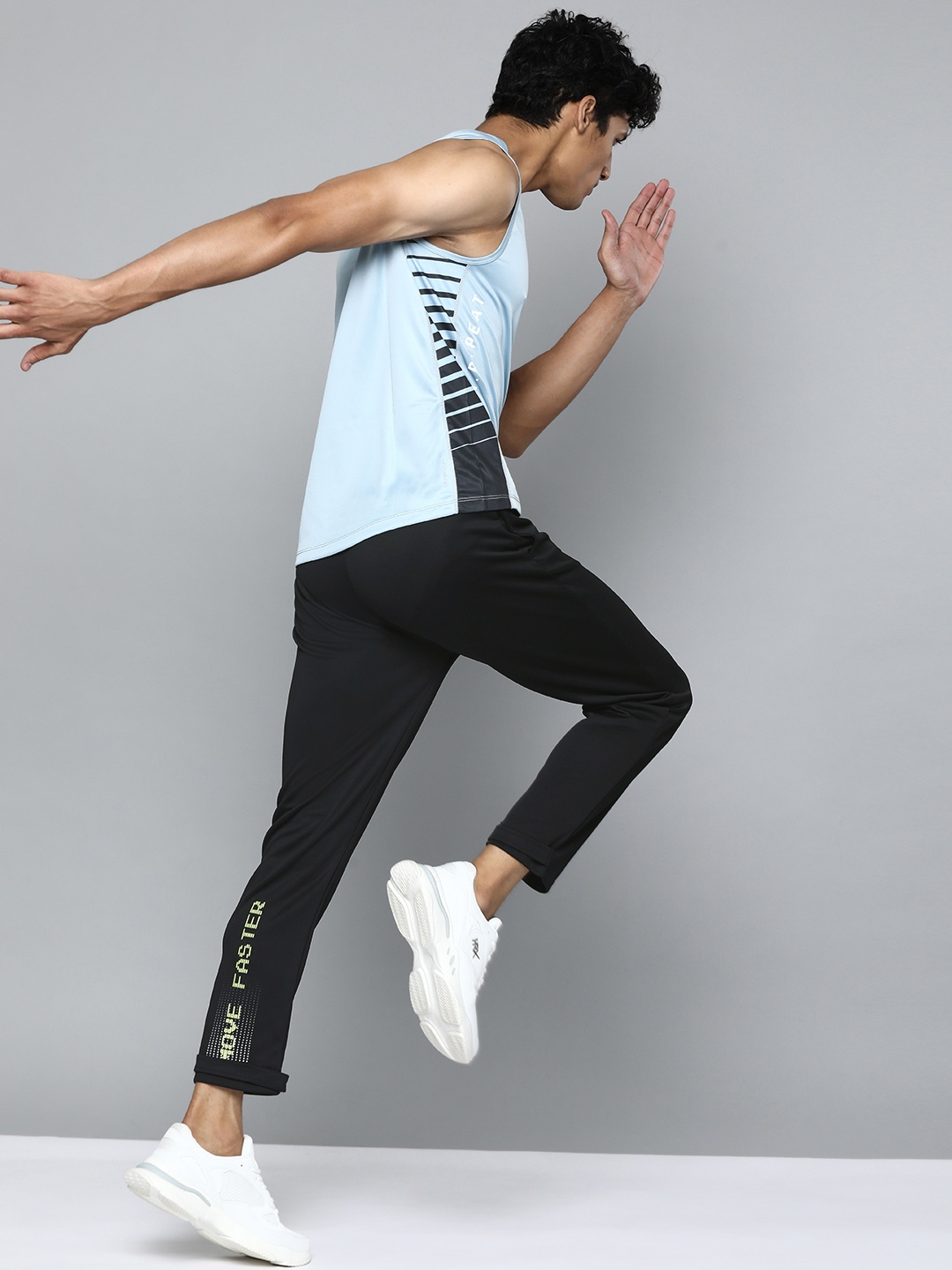

HRX By Hrithik Roshan Men Jet Black Solid Tappered Fit Rapid-Dry Running Track Pants