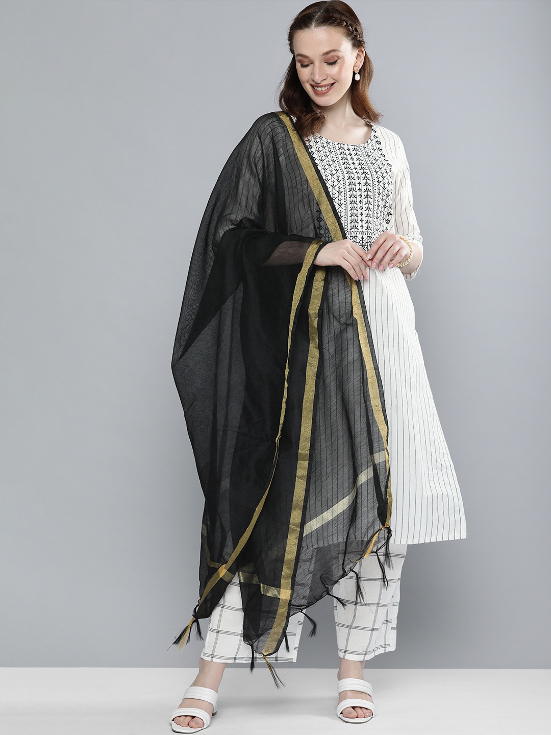 

Vishudh Women Off White Striped Regular Pure Cotton Kurta with Palazzos