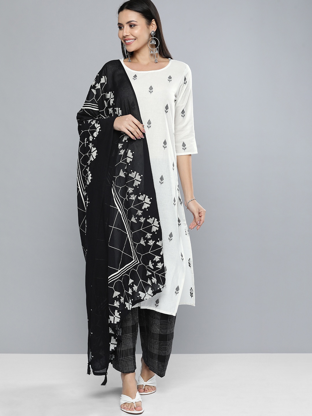 

Vishudh Women Off-White & Black Printed Kurta with Palazzos & Dupatta