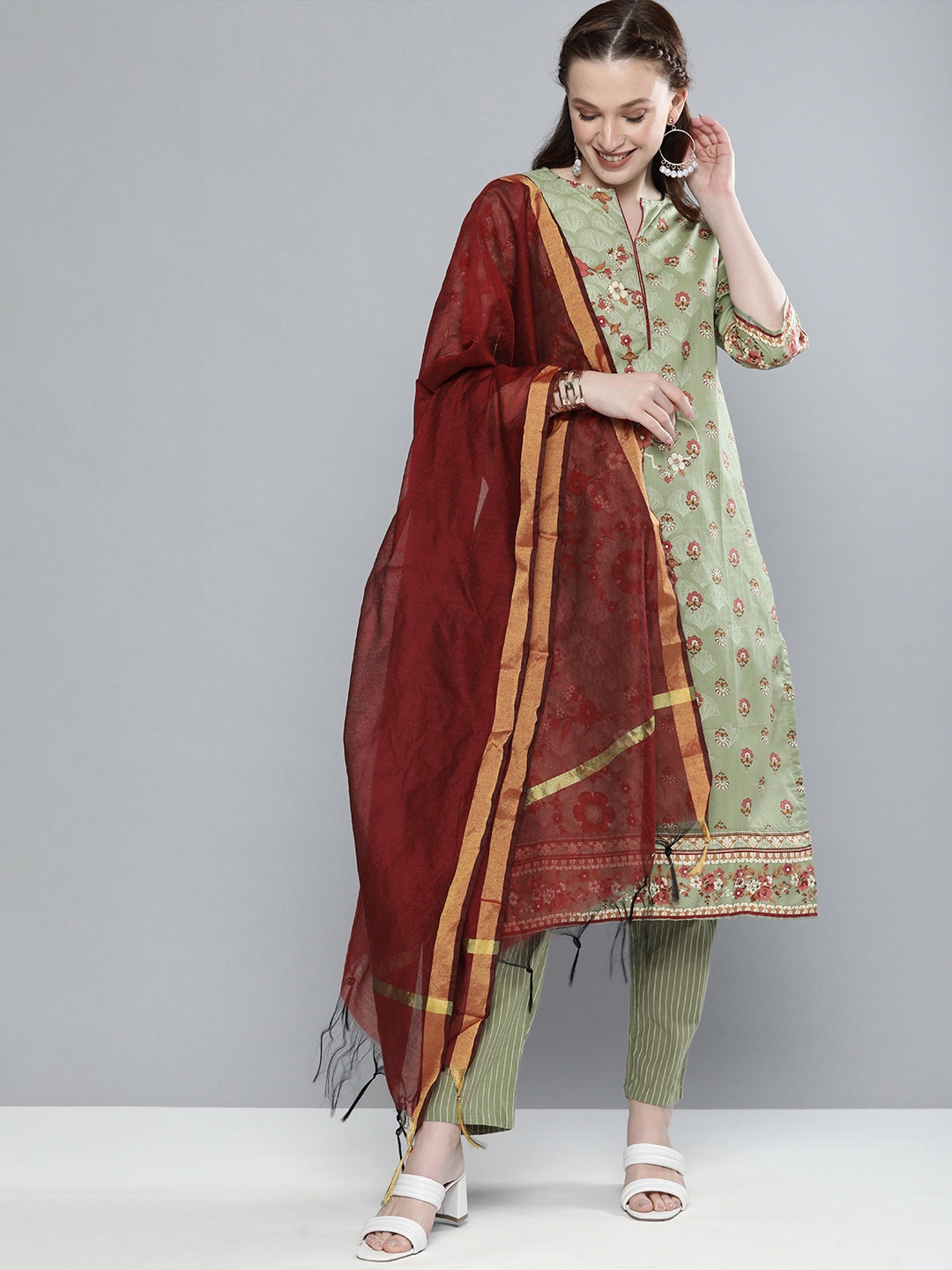 

Vishudh Women Green & Rust Red Printed Kurta with Trousers & Dupatta