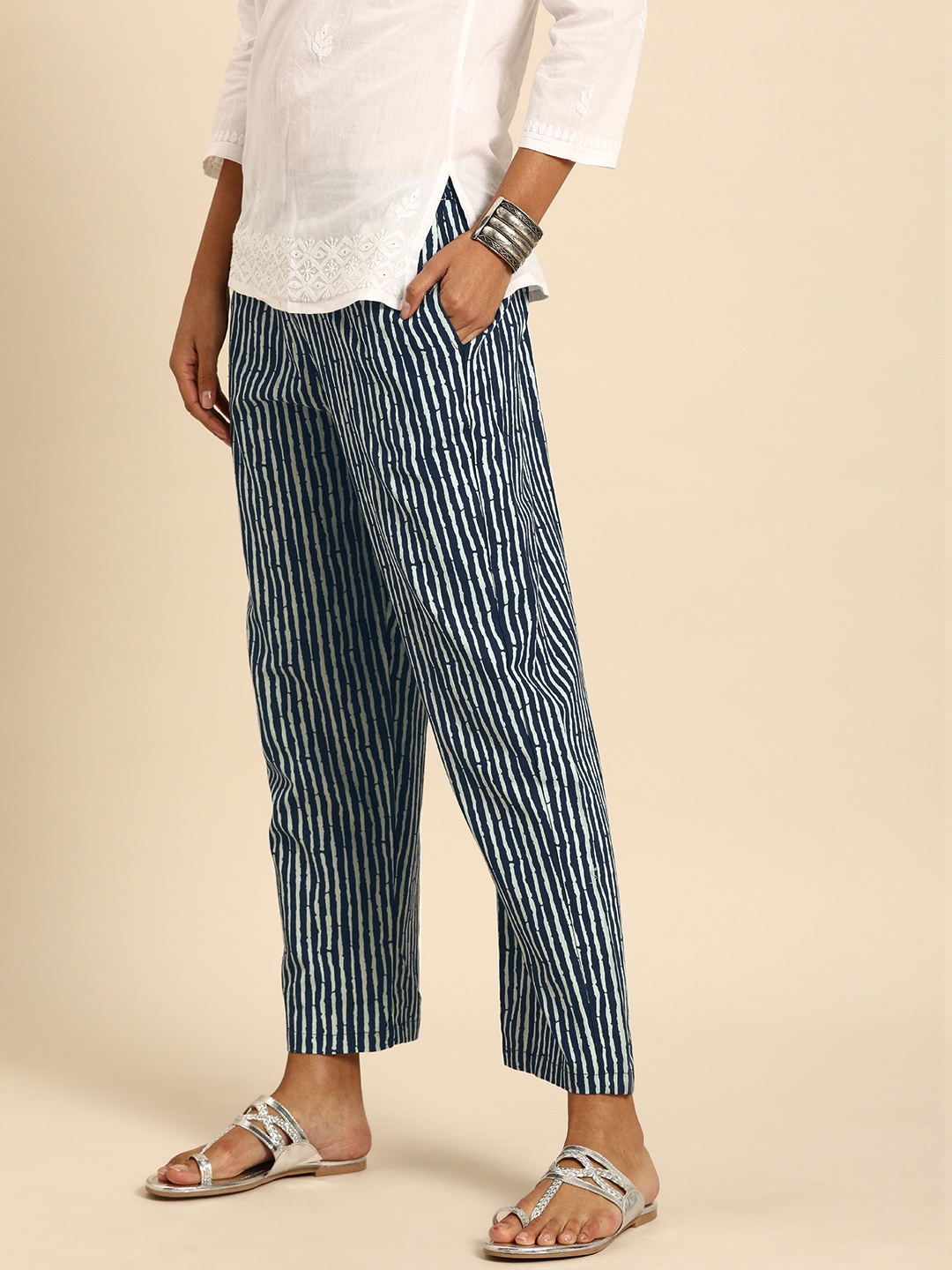 

Rajnandini Women Navy Blue & White Striped Pure Cotton Straight Palazzos
