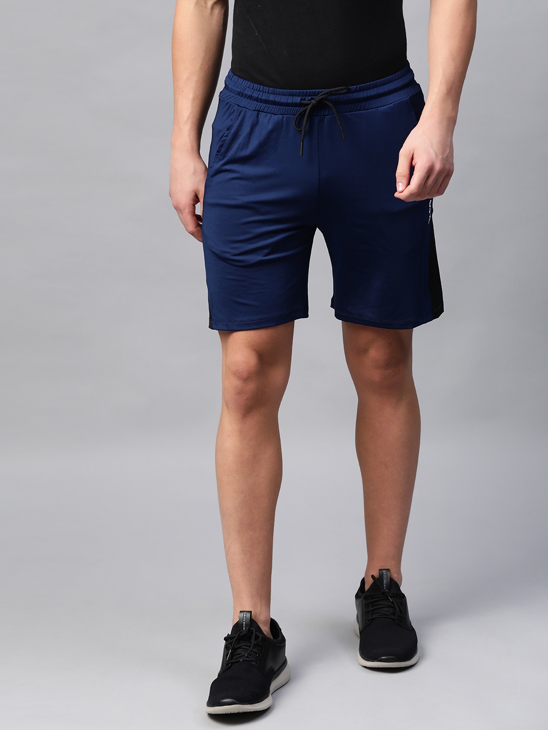 

Alcis Men Navy Blue Solid Slim Fit Sports Shorts