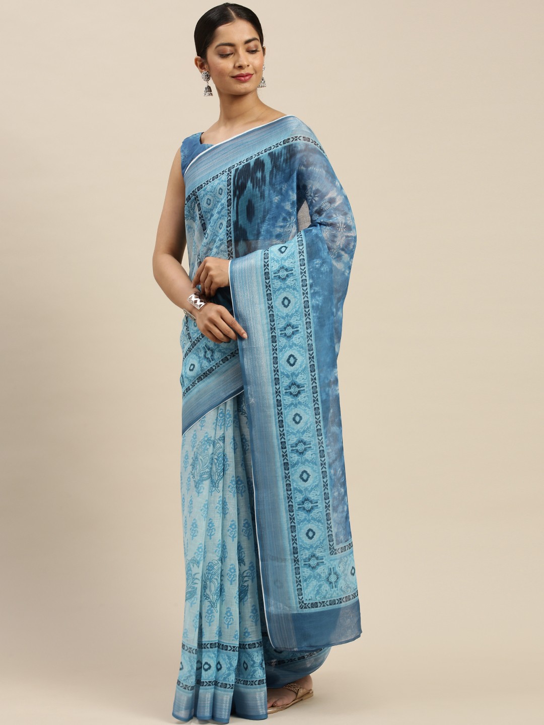 

Mitera Blue Printed Linen Saree